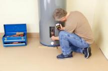 one of our Centreville VA plumbers is repairing a water heater